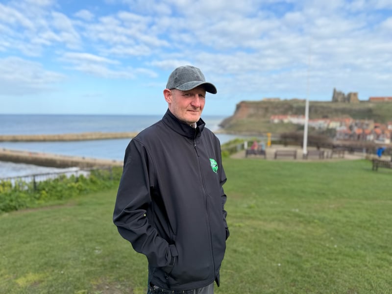 Richard Clarkson of Esk Pest Control with Whitby Harbour in the background